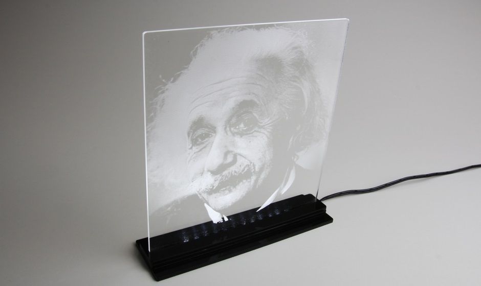 Laser engraving of image on acrylic illuminated by LED light