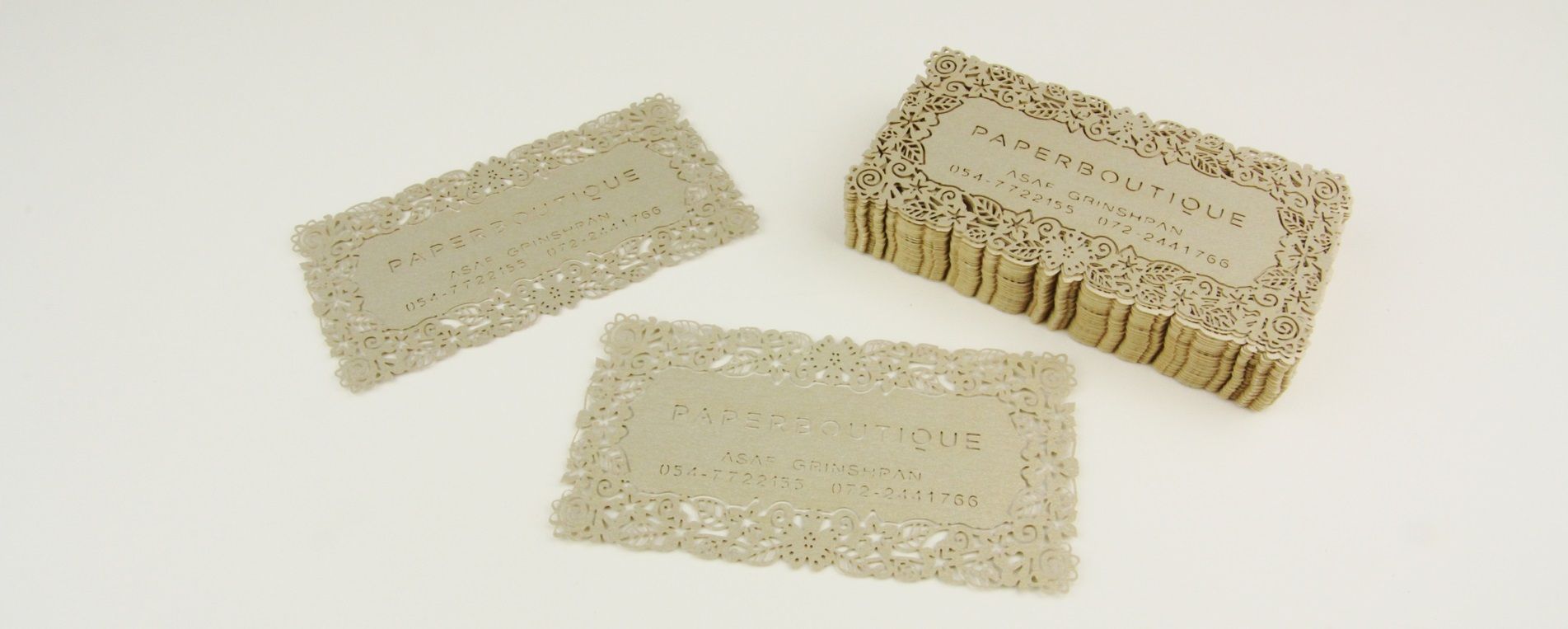 Laser cutting of business card in a lace look and feel