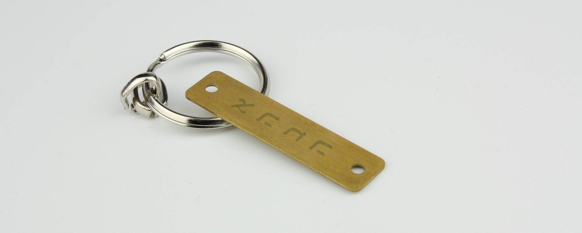 Laser cutting and marking of Brass tags - 0.5 mm thick