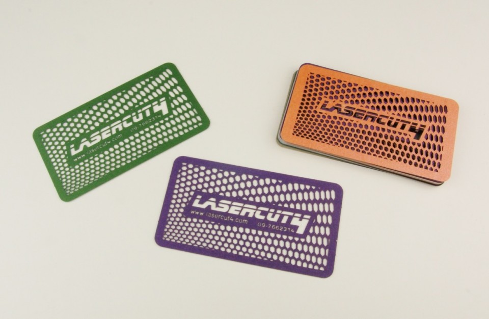Laser-cut business cards in a variety of colors