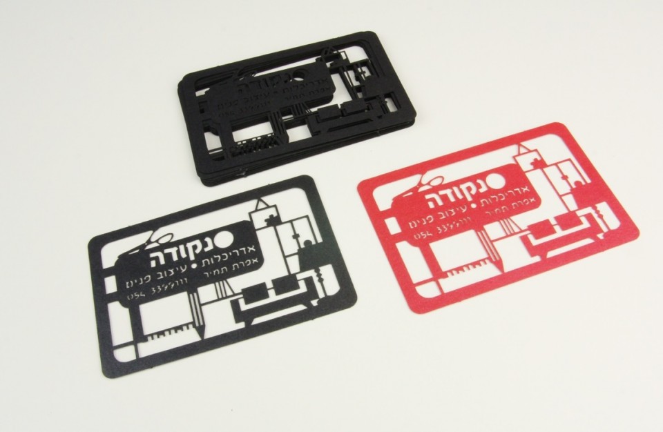 Laser cutting of designed business cards (design: dot - architecture and interior design)