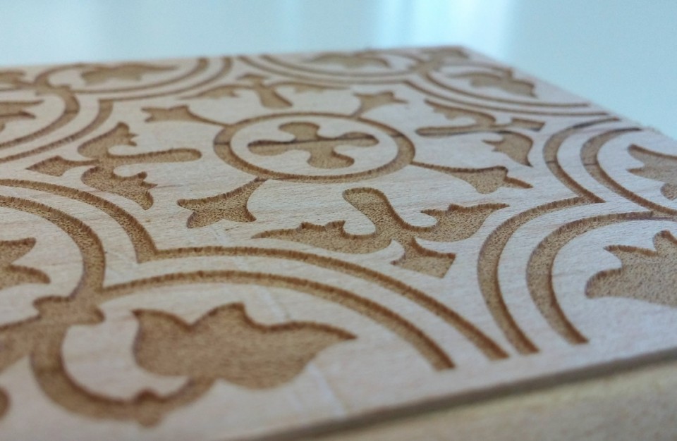 Laser Engraving of oriental Graphics on Maple Tree