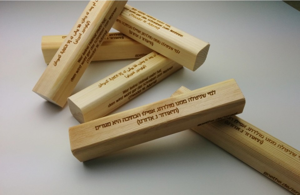 Laser Engraving on a wood - text in three languages