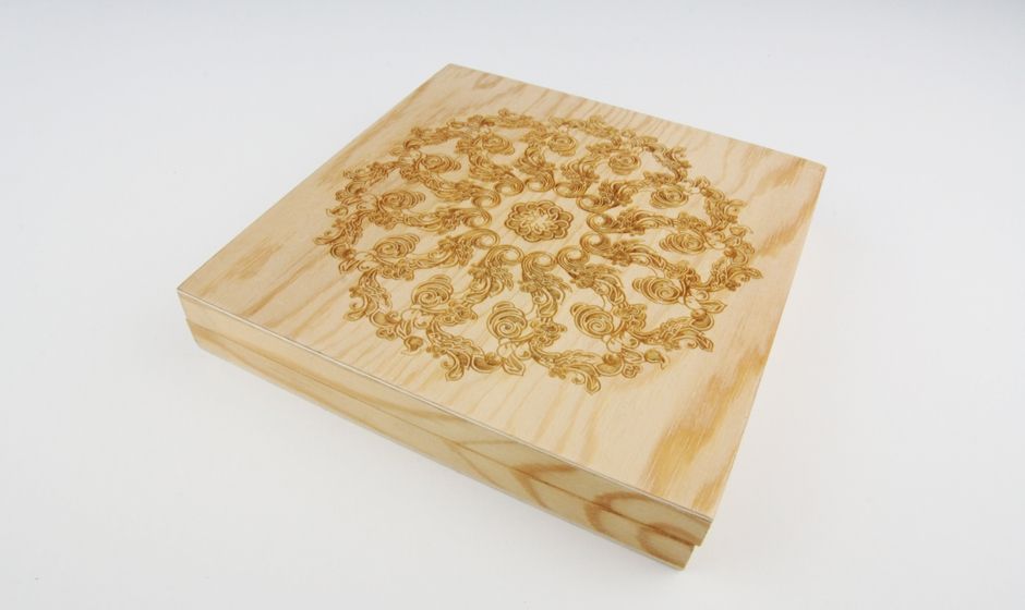 Laser engraving on a wooden case - floral graphic 